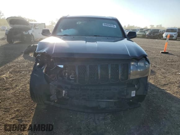 ✅ 2006 Jeep Grand Cherokee SRT-8 • VIN: 1J8HR78366C341693 • Лот: 84034915. Опубликован ранее на Copart с пробегом 103 792 миль. Бесплатный доступ к архиву аукционных продаж из США и подробный отчёт об истории автомобиля на DreamBid. Изображение 5.