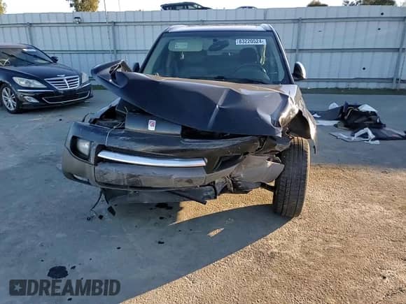 2004 Saturn VUE V6 z VIN 5GZCZ53404S873769, wystawiony jako Copart lot #83220524 z przebiegiem 243 262 mil mil oraz Szkoda całkowita • Salvage title. Historia ofert i sprzedaży dostępna na DreamBid. Obrazek 11.