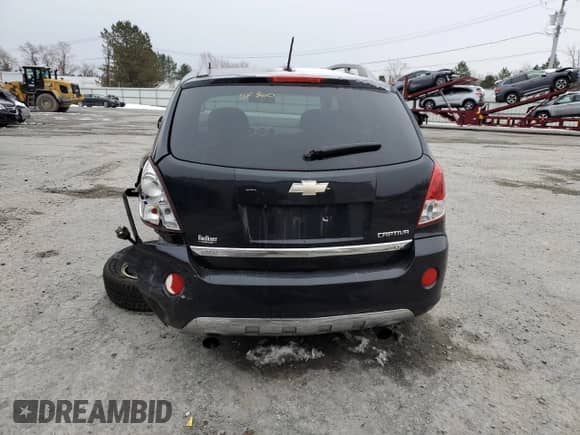 2012 Chevrolet Captiva Sport LTZ z VIN 3GNFL4E5XCS624082, wystawiony jako Copart lot #83013754 z przebiegiem 107 037 mil mil oraz Szkoda całkowita • Salvage title. Historia ofert i sprzedaży dostępna na DreamBid. Obrazek 6.