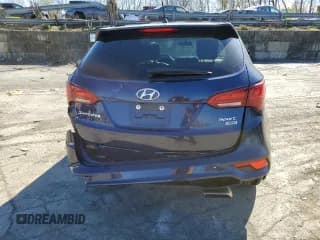 ✅ 2018 Hyundai Santa Fe 2.4L • VIN: 5XYZTDLB1JG514440 • Лот: 50703004. Опубликован ранее на Copart с пробегом 92 545 миль. Бесплатный доступ к архиву аукционных продаж из США и подробный отчёт об истории автомобиля на DreamBid. Изображение 6.