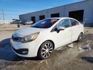 ✅ 2012 Kia Rio EX • VIN: KNADN4A36C6047535 • Lot: 90049595. Listed on Copart with 46,603 mi. Free auction sales archive from the USA and detailed vehicle history report at DreamBid. Image 1.