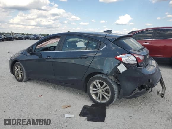 ✅ 2019 Chevrolet Cruze LT • VIN: 3G1BE6SM5KS555978 • Lot: 71033325. Listed on Copart with 103,493 mi. Free auction sales archive from the USA and detailed vehicle history report at DreamBid. Image 2.