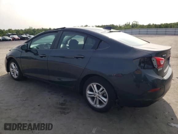 ✅ 2017 Chevrolet Cruze LT • VIN: 1G1BE5SMXH7137711 • Lot: 51823923. Listed on Copart with 33,429 mi. Free auction sales archive from the USA and detailed vehicle history report at DreamBid. Image 2.