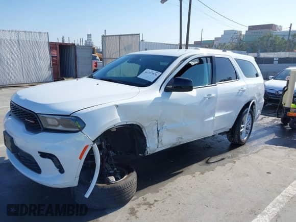 2023 Dodge Durango GT with VIN 1C4RDJDG4PC556295, listed as a IAAI auction lot 42227876 with 55,774 mi miles and . Bid and sale history available at DreamBid. Image 2.