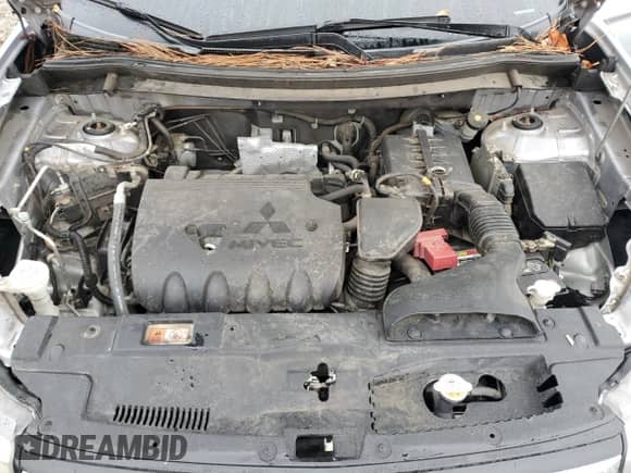 2014 Mitsubishi Outlander SE with VIN JA4AD3A38EZ016947, listed as a Copart auction lot 89506085 with 126,003 mi miles and Salvage title. Bid and sale history available at DreamBid. Image 12.