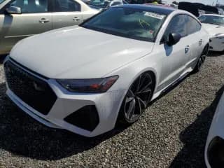 ✅ 2023 Audi RS 7 • VIN: WUAPCBF2XPN906263 • Lot: 74240364. Wystawiony na Copart z przebiegiem Nie podano. Bezpłatny archiwum sprzedaży aukcyjnych z USA i szczegółowy raport historii pojazdu na DreamBid. Zdjęcie 1.