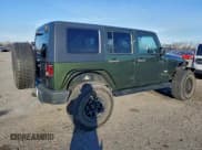 ✅ 2008 Jeep Wrangler Unlimited Sahara • VIN: 1J8GA59148L553239 • Lot: 94098485. Listed on Copart with 136,730 mi. Free auction sales archive from the USA and detailed vehicle history report at DreamBid. Image 3.