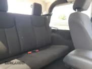 ✅ 2018 Jeep Wrangler Willys Wheeler W • VIN: 1C4AJWAG7JL860204 • Lot: 60683605. Listed on Copart with 59,606 mi. Free auction sales archive from the USA and detailed vehicle history report at DreamBid. Image 11.