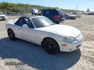✅ 2003 Mazda MX-5 Miata Cloth • VIN: JM1NB353630304586 • Lot: 43445554. Wystawiony na IAAI z przebiegiem 73 189 mil. Bezpłatny archiwum sprzedaży aukcyjnych z USA i szczegółowy raport historii pojazdu na DreamBid. Zdjęcie 1.