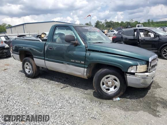 1999 Dodge 1500 with VIN 1B7HC16X0XS128659, listed as a Copart auction lot 59984365 with 192,528 mi miles and Salvage title. Bid and sale history available at DreamBid. Image 4.