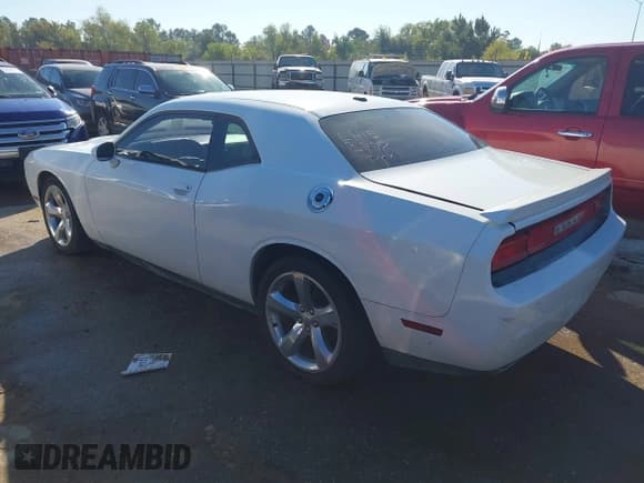 ✅ 2014 Dodge Challenger SXT • VIN: 2C3CDYAG1EH153778 • Лот: 43589521. Опубликован ранее на IAAI с пробегом 185 848 миль. Бесплатный доступ к архиву аукционных продаж из США и подробный отчёт об истории автомобиля на DreamBid. Изображение 3.