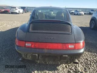 ✅ 1996 Porsche 911 • VIN: WP0DA2996TS385231 • Lot: 83699964. Wystawiony na Copart z przebiegiem 60 492 mil. Bezpłatny archiwum sprzedaży aukcyjnych z USA i szczegółowy raport historii pojazdu na DreamBid. Zdjęcie 6.