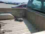 2005 Chevrolet Silverado 1500 Work Truck с VIN 1GCEC14X25Z179607, выставлен на аукционе Copart как лот 59317655 с пробегом 117 648 миль миль и Списание • Salvage title. История ставок и продаж доступна на DreamBid. Изображение 10.