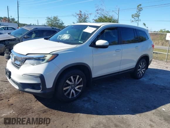 ✅ 2019 Honda Pilot EX-L • VIN: 5FNYF6H53KB022101 • Lot: 43682057. Wystawiony na IAAI z przebiegiem 133 961 mil. Bezpłatny archiwum sprzedaży aukcyjnych z USA i szczegółowy raport historii pojazdu na DreamBid. Zdjęcie 2.