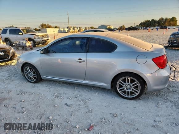 ✅ 2007 Scion tC • VIN: JTKDE167170195641 • Лот: 91698915. Опубликован ранее на Copart с пробегом 202 464 миль. Бесплатный доступ к архиву аукционных продаж из США и подробный отчёт об истории автомобиля на DreamBid. Изображение 2.