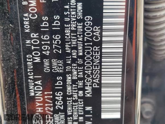 2012 Hyundai Genesis 3.8L z VIN KMHGC4DD0CU170099, wystawiony jako Copart lot #67594234 z przebiegiem 191 437 mil mil oraz Szkoda całkowita • Salvage title. Historia ofert i sprzedaży dostępna na DreamBid. Obrazek 12.