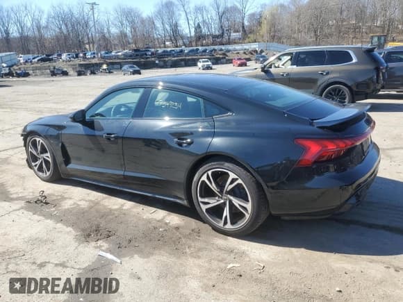 ✅ 2023 Audi e-tron GT Premium Plus • VIN: WAUCJBFW9P7000711 • Лот: 47349234. Опубликован ранее на Copart с пробегом 4 714 миль. Бесплатный доступ к архиву аукционных продаж из США и подробный отчёт об истории автомобиля на DreamBid. Изображение 2.