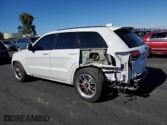 ✅ 2017 Jeep Grand Cherokee SRT • VIN: 1C4RJFDJ4HC753650 • Lot: 90882435. Listed on Copart with 124,125 mi. Free auction sales archive from the USA and detailed vehicle history report at DreamBid. Image 2.