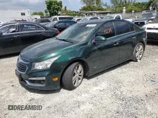 ✅ 2015 Chevrolet Cruze LTZ • VIN: 1G1PG5SB8F7254926 • Lot: 46244653. Listed on Copart with 152,210 mi. Free auction sales archive from the USA and detailed vehicle history report at DreamBid. Image 1.