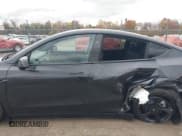 ✅ 2026 Tesla Model Y Long Range • VIN: 7SAYGDED4TF437624 • Lot: 43590088. Listed on IAAI with 1,167 mi. Free auction sales archive from the USA and detailed vehicle history report at DreamBid. Image 15.