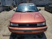 ✅ 1991 Toyota Corolla • VIN: 1NXAE94A0MZ235179 • Lot: 67806155. Listed on Copart with 103,758 mi. Free auction sales archive from the USA and detailed vehicle history report at DreamBid. Image 5.