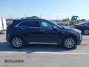 ✅ 2022 Cadillac XT4 FWD Premium Luxury • VIN: 1GYFZCR42NF111395 • Lot: 42772446. Wystawiony na IAAI z przebiegiem 29 059 mil. Bezpłatny archiwum sprzedaży aukcyjnych z USA i szczegółowy raport historii pojazdu na DreamBid. Zdjęcie 13.
