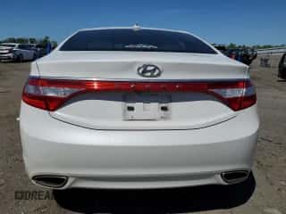 2013 Hyundai Azera z VIN KMHFG4JG4DA223002, wystawiony jako Copart lot #54886085 z przebiegiem 164 125 mil mil oraz Czysty tytuł • Clean title. Historia ofert i sprzedaży dostępna na DreamBid. Obrazek 6.