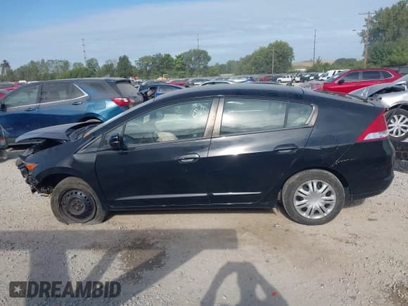 ✅ 2010 Honda Insight LX • VIN: JHMZE2H58AS014236 • Lot: 43103095. Listed on IAAI with 159,573 mi. Free auction sales archive from the USA and detailed vehicle history report at DreamBid. Image 15.