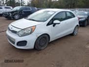 ✅ 2012 Kia Rio EX • VIN: KNADN5A3XC6026743 • Lot: 43879072. Listed on IAAI with 148,340 mi. Free auction sales archive from the USA and detailed vehicle history report at DreamBid. Image 2.