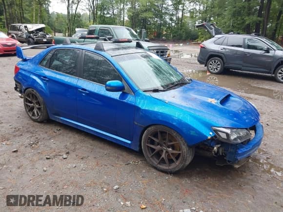 ✅ 2014 Subaru WRX WRX STI • VIN: JF1GV8J62EL003673 • Lot: 43240628. Listed on IAAI with 150,923 mi. Free auction sales archive from the USA and detailed vehicle history report at DreamBid. Image 1.