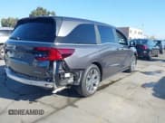 ✅ 2026 Honda Odyssey Touring • VIN: 5FNRL6H86TB015099 • Lot: 43633848. Listed on IAAI with 897 mi. Free auction sales archive from the USA and detailed vehicle history report at DreamBid. Image 4.