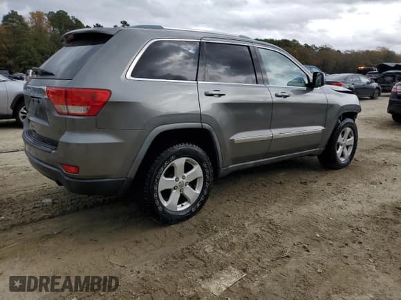 ✅ 2011 Jeep Grand Cherokee Laredo • VIN: 1J4RR4GG8BC713439 • Lot: 89436715. Listed on Copart with 114,432 mi. Free auction sales archive from the USA and detailed vehicle history report at DreamBid. Image 3.