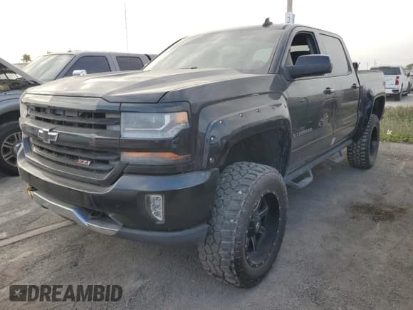 ✅ 2016 Chevrolet Silverado 1500 LT • VIN: 3GCUKREC1GG225617 • Лот: 74351424. Опубликован ранее на Copart с пробегом 142 827 миль. Бесплатный доступ к архиву аукционных продаж из США и подробный отчёт об истории автомобиля на DreamBid. Изображение 1.