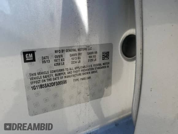 2013 Chevrolet Malibu LS z VIN 1G11B5SA2DF306596, wystawiony jako Copart lot #81811765 z przebiegiem 97 884 mil mil oraz Nie do naprawy • Non repairable. Historia ofert i sprzedaży dostępna na DreamBid. Obrazek 12.