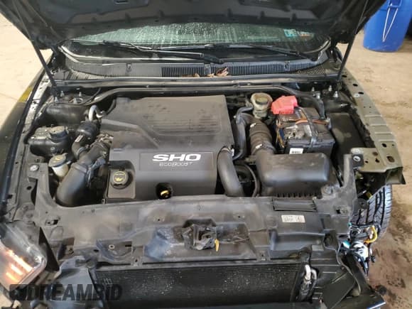 ✅ 2015 Ford Taurus SHO • VIN: 1FAHP2KT8FG153345 • Lot: 61566365. Listed on Copart with 174,909 mi. Free auction sales archive from the USA and detailed vehicle history report at DreamBid. Image 11.