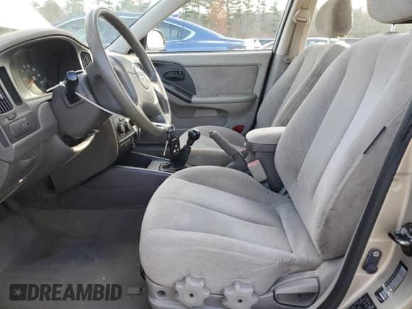 2005 Hyundai Elantra GLS z VIN KMHDN46D25U126151, wystawiony jako Copart lot #77417824 z przebiegiem 165 114 mil mil oraz Szkoda całkowita • Salvage title. Historia ofert i sprzedaży dostępna na DreamBid. Obrazek 7.