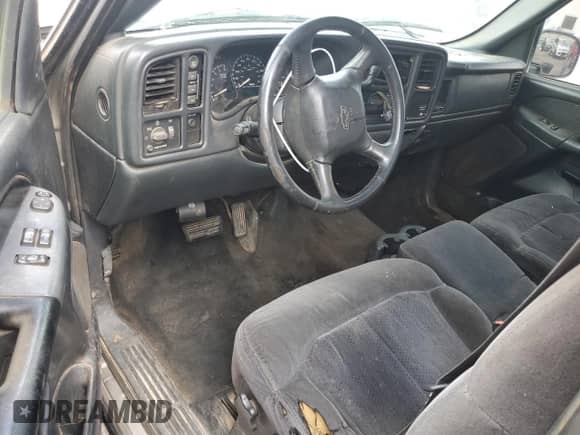 2002 Chevrolet Silverado 1500 LS with VIN 1GCEK14T72Z106860, listed as a Copart auction lot 54909765 with 301,431 mi miles and Salvage title. Bid and sale history available at DreamBid. Image 8.