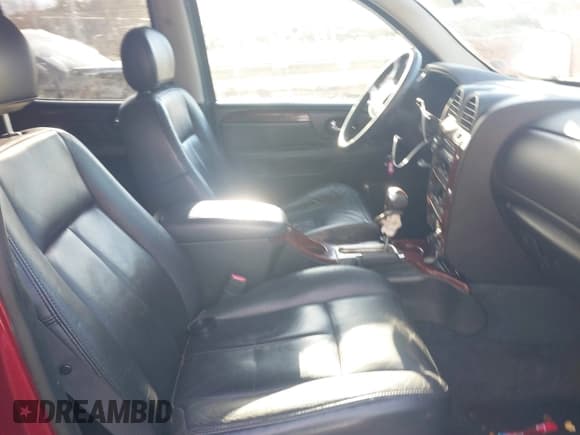 ✅ 2005 GMC Envoy SLT • VIN: 1GKET16M956158147 • Lot: 41683236. Listed on IAAI with Not provided. Free auction sales archive from the USA and detailed vehicle history report at DreamBid. Image 5.