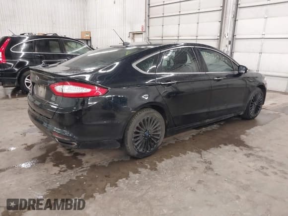 ✅ 2016 Ford Fusion Titanium • VIN: 3FA6P0K94GR158892 • Lot: 43559354. Listed on IAAI with 206,905 mi. Free auction sales archive from the USA and detailed vehicle history report at DreamBid. Image 4.