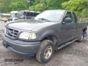 ✅ 2004 Ford F-150 XL • VIN: 2FTRX18W84CA34574 • Lot: 42259501. Listed on IAAI with 79,950 mi. Free auction sales archive from the USA and detailed vehicle history report at DreamBid. Image 2.