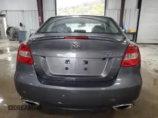 ✅ 2013 Suzuki Kizashi SLS Sport • VIN: JS2RF9A82D6100298 • Лот: 92465785. Опубликован ранее на Copart с пробегом 75 068 миль. Бесплатный доступ к архиву аукционных продаж из США и подробный отчёт об истории автомобиля на DreamBid. Изображение 6.