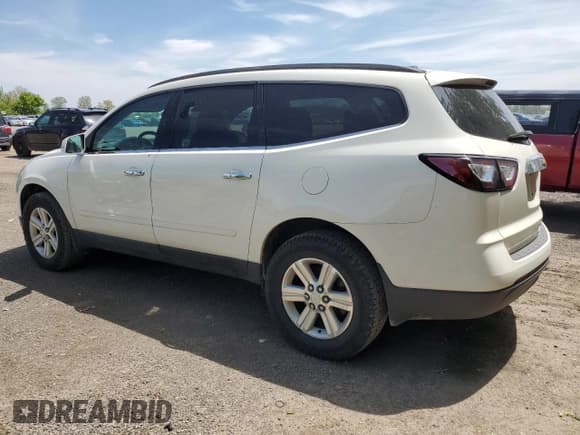 ✅ 2013 Chevrolet Traverse LT • VIN: 1GNKRGKDXDJ256810 • Lot: 57332035. Listed on Copart with 128,990 mi. Free auction sales archive from the USA and detailed vehicle history report at DreamBid. Image 2.
