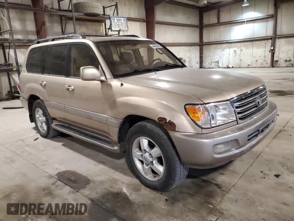 ✅ 2003 Toyota Land Cruiser • VIN: JTEHT05J132041320 • Lot: 44438895. Listed on Copart with 256,815 mi. Free auction sales archive from the USA and detailed vehicle history report at DreamBid. Image 4.