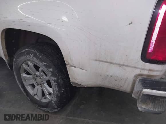 2020 Chevrolet Colorado 4WD LT z VIN 1GCHTCEA7L1180802, wystawiony jako IAAI lot #41488428 z przebiegiem 94 430 mil mil oraz . Historia ofert i sprzedaży dostępna na DreamBid. Obrazek 6.