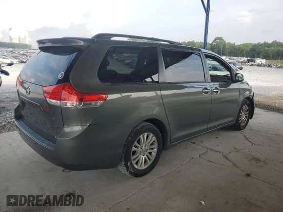 2011 Toyota Sienna XLE AAS с VIN 5TDYK3DC4BS132990, выставлен на аукционе Copart как лот 69782765 с пробегом 253 780 миль миль и Списание • Salvage title. История ставок и продаж доступна на DreamBid. Изображение 3.