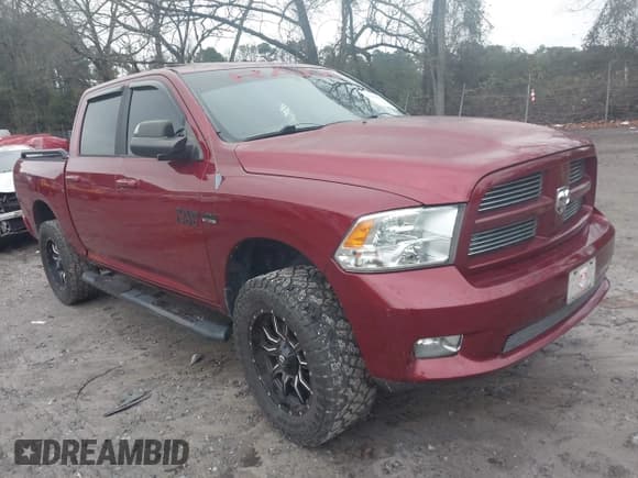 ✅ 2012 Ram 1500 Sport • VIN: 1C6RD7MTXCS208654 • Lot: 43866907. Listed on IAAI with 185,621 mi. Free auction sales archive from the USA and detailed vehicle history report at DreamBid. Image 1.