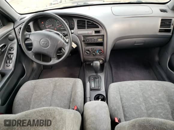 2003 Hyundai Elantra GLS с VIN KMHDN45D93U669804, выставлен на аукционе Copart как лот 79068184 с пробегом 66 490 миль миль и Списание • Salvage title. История ставок и продаж доступна на DreamBid. Изображение 8.
