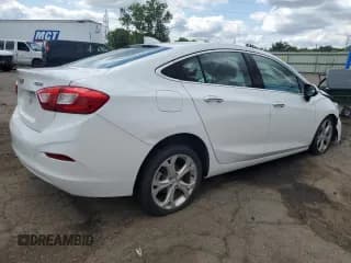 ✅ 2017 Chevrolet Cruze Premier • VIN: 1G1BF5SM3H7237257 • Lot: 60329633. Listed on Copart with 106,037 mi. Free auction sales archive from the USA and detailed vehicle history report at DreamBid. Image 3.