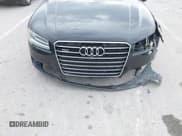 ✅ 2015 Audi A8 4.0T • VIN: WAU32AFD9FN009649 • Lot: 42367874. Wystawiony na IAAI z przebiegiem 138 462 mil. Bezpłatny archiwum sprzedaży aukcyjnych z USA i szczegółowy raport historii pojazdu na DreamBid. Zdjęcie 17.