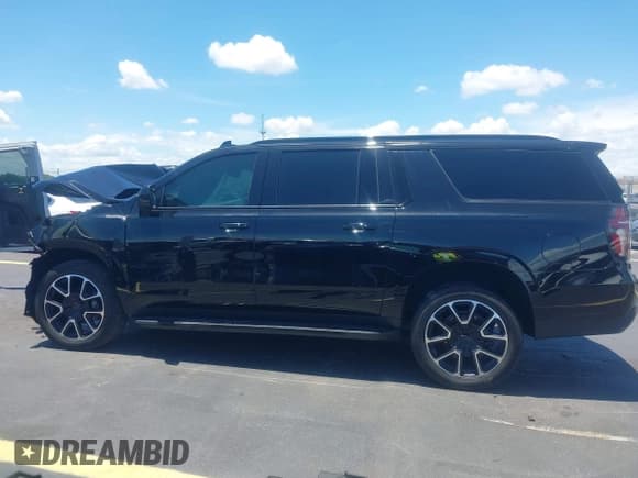 ✅ 2023 Chevrolet Suburban • VIN: 1GNSCEKT8PR130495 • Lot: 42572996. Listed on IAAI with 115,347 mi. Free auction sales archive from the USA and detailed vehicle history report at DreamBid. Image 14.